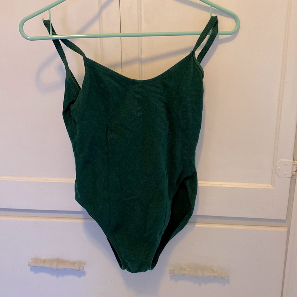 Forest green Capezio sleeveless dance leotard. Says Large, but fits medium.